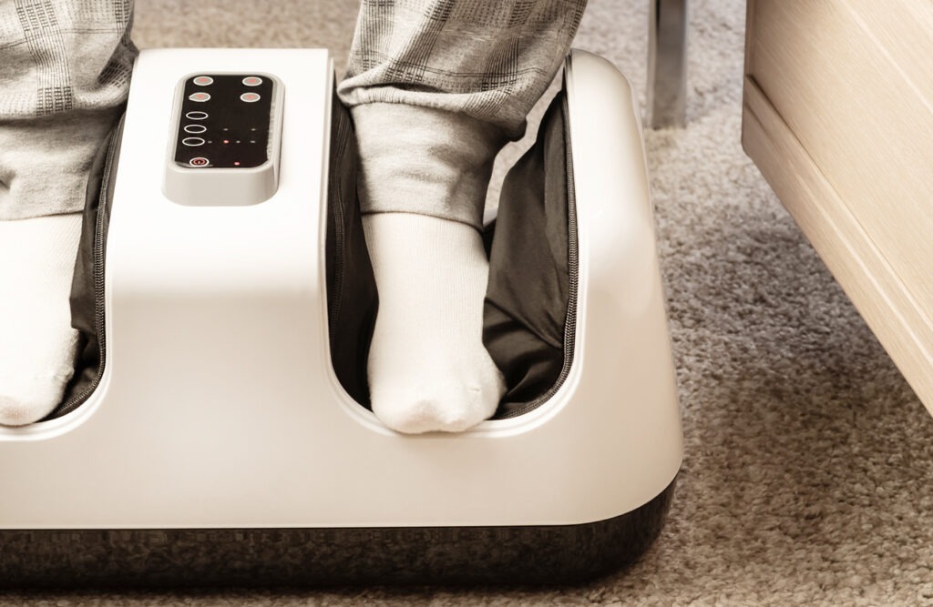massager, foot, electricity, people, apartment, beauty treatment, care, color image, concepts, efficiency, equipment, healthcare and medicine