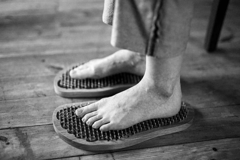 Wooden foot massager device